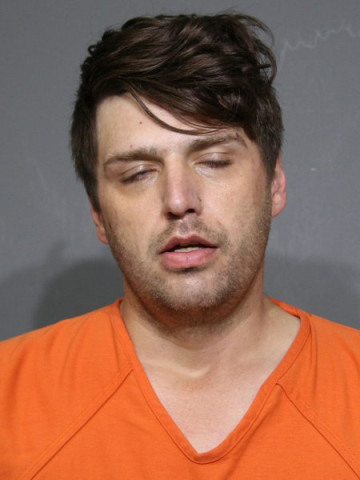 Mugshot of Cole,