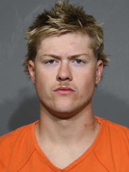 Mugshot of Huggins,