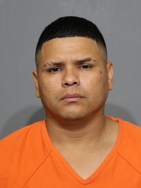 Mugshot of Flores,