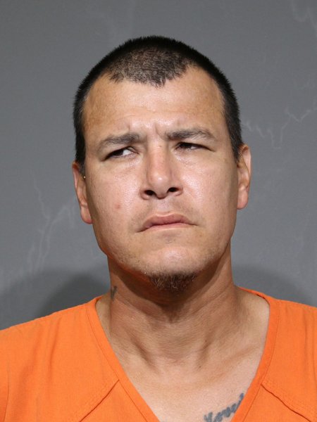 Mugshot of French,