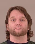 Mugshot of Aaron Matthew Schlossin