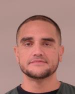 Mugshot of Justin Kainoa Kaneakua