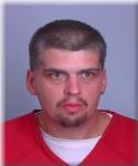 Mugshot of Justin Dionysius