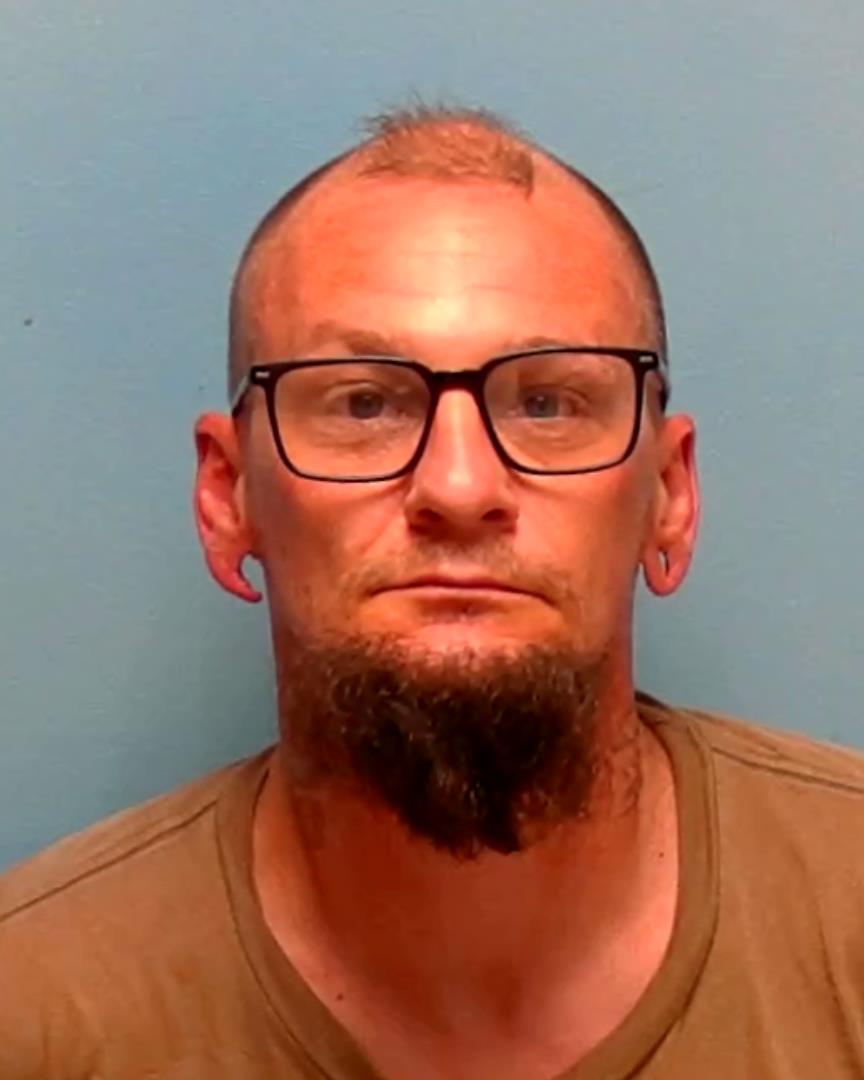 Mugshot of RUSSELL CARLSON