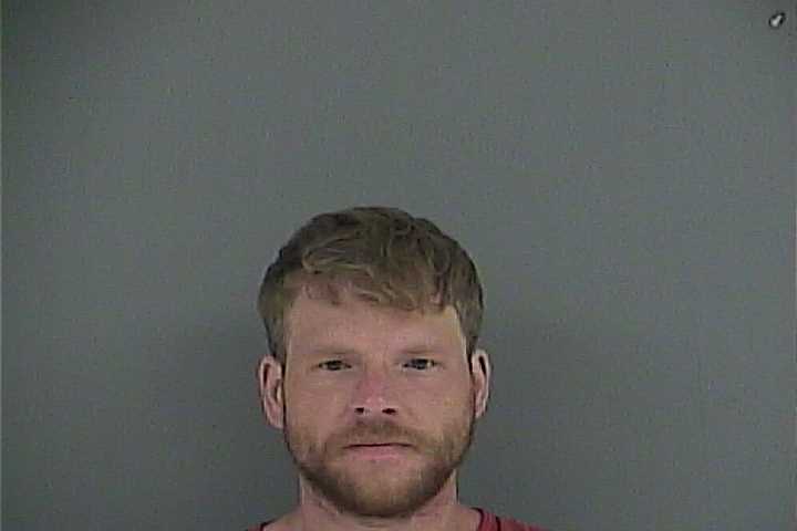 Mugshot of ANDRUE T THACKER