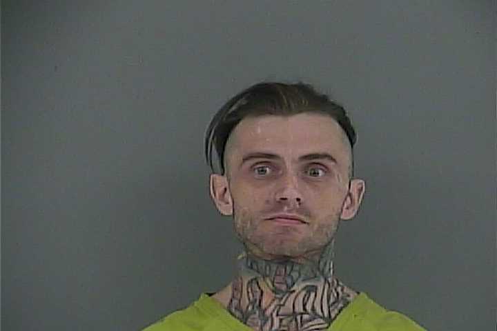Mugshot of ERIC W RIDENOUR