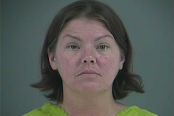 Mugshot of MELISSA C MONK