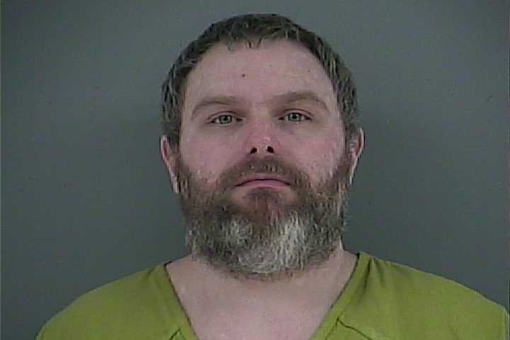 Mugshot of JOSHUA A MILLER