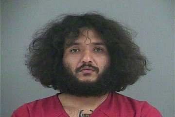 Mugshot of CARLOS E ALMAO