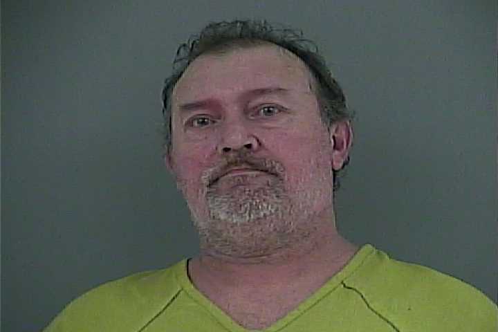 Mugshot of MICHAEL J SUTTON
