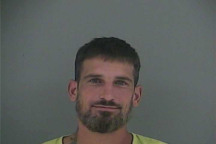 Mugshot of DEREK A ELY