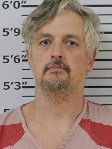 Mugshot of DUSTIN JAMES THOMPSON