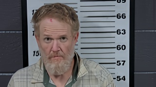 Mugshot of JOHN E JR DISHMAN