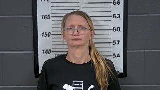 Mugshot of CHRISTA K MOORE