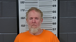 Mugshot of JOHN E JR DISHMAN