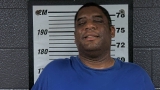 Mugshot of REGINALD F JR MADKINS