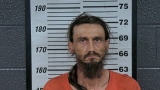 Mugshot of MARLAND L HOOVER