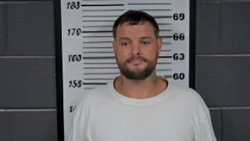 Mugshot of JUSTIN M NELSON