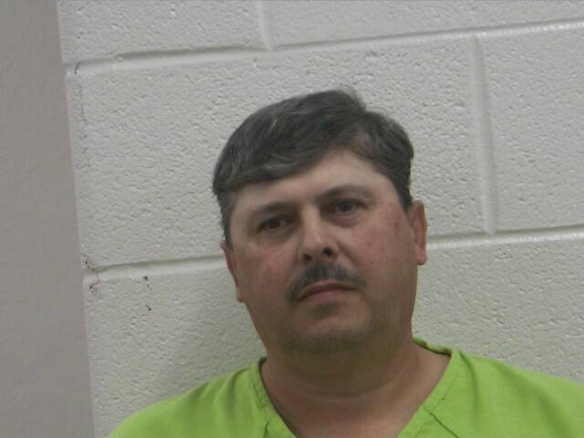 Mugshot of KENNETH W REED