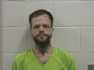 Mugshot of MATTHEW A DEERING