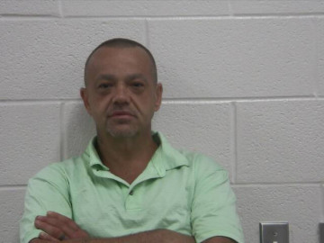 Mugshot of JAMES E MULLINS