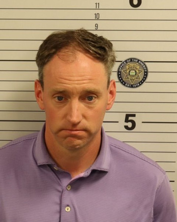 Mugshot of JUSTIN M WHITAKER