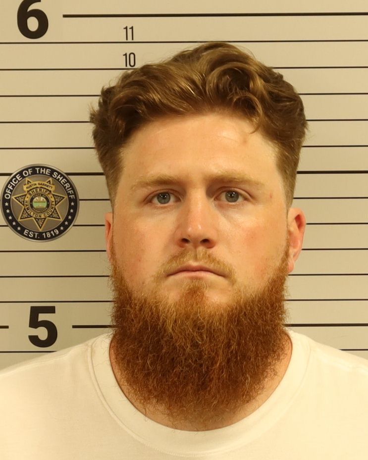 Mugshot of TUCKER DAKOTA RHODES