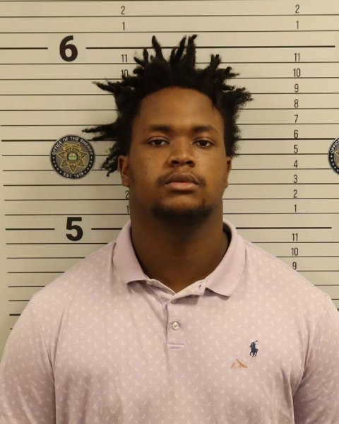 Mugshot of JULIAN ROMOANE KINAMORE