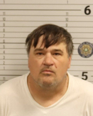 Mugshot of TRAVIS LYN HIGDON