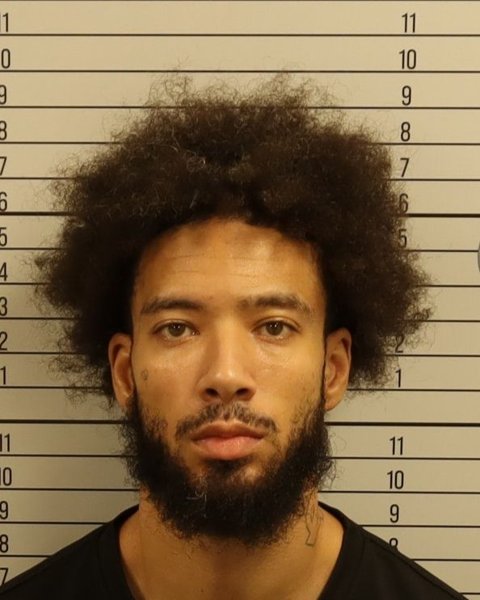 Mugshot of DESMOND D SANTIAGO