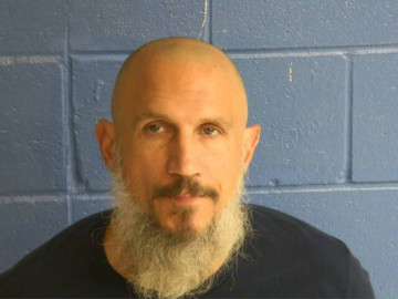 Mugshot of DUSTIN J BRAUN