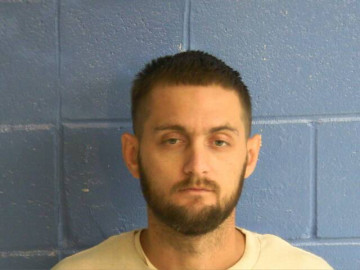Mugshot of DUSTIN J SAVLEY