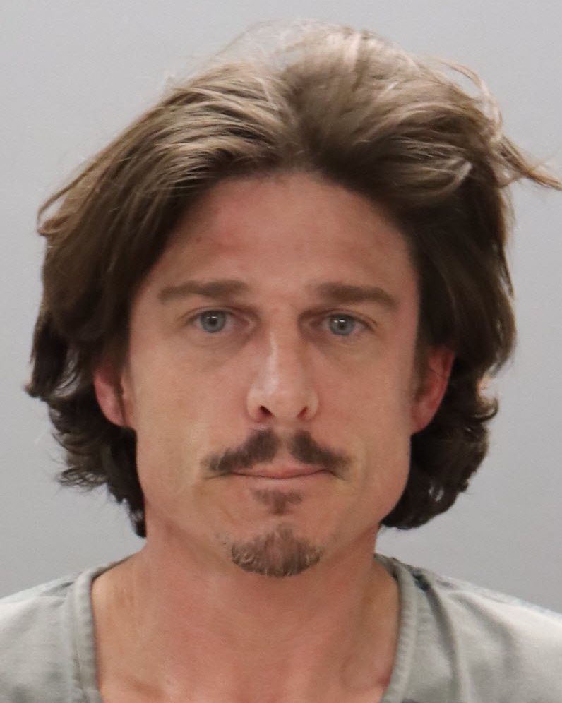 Mugshot of JOHN MICHAEL WOODHAM