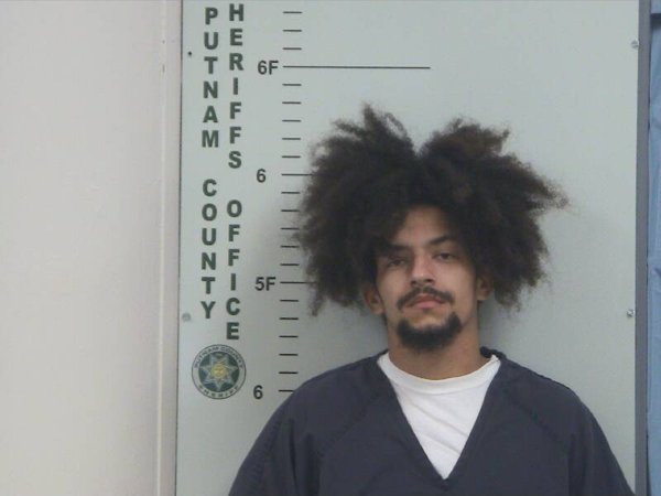 Mugshot of KENETH Y SANTIAGO