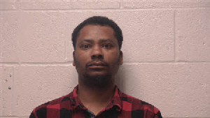 Mugshot of Ali Simbi
