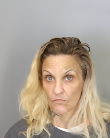 Mugshot of CATHERINE MASENGIL