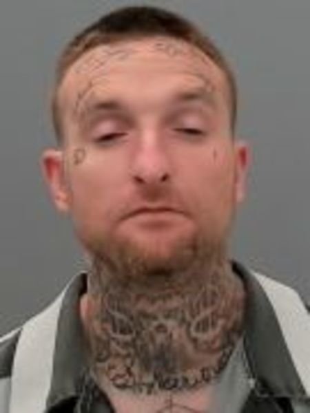 Mugshot of MICHAEL CODY POOLE