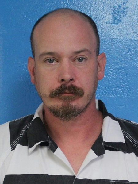 Mugshot of TREVOR JUSTIN HENNE