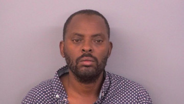 Mugshot of MBEREYE LAMBERT