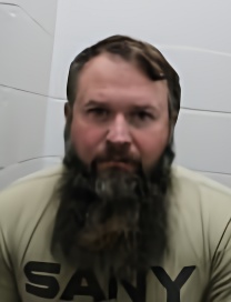 Mugshot of TRAVIS LACY ROBERTS