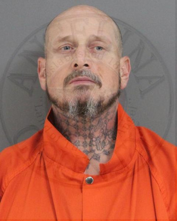Mugshot of MICHAEL LLOMA HUGHES