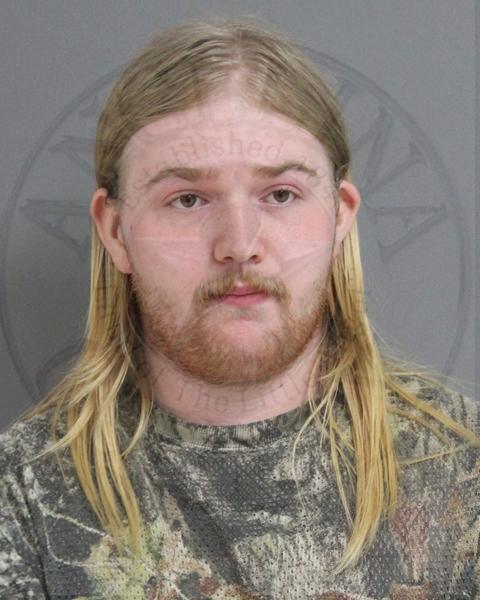Mugshot of DEVIN HELTON