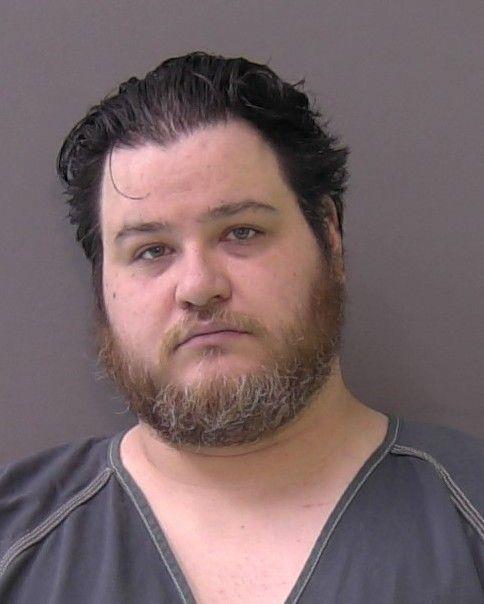 Mugshot of JOHN DAKOTAH HOWLE