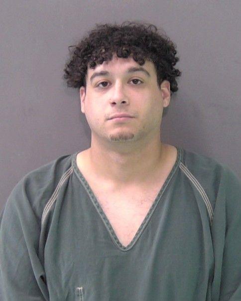 Mugshot of EXAVIER MANUEL CRUZ