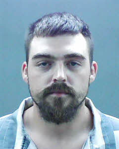 Mugshot of Travis Austin Basey