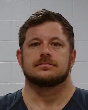 Mugshot of Justin Edward Roy