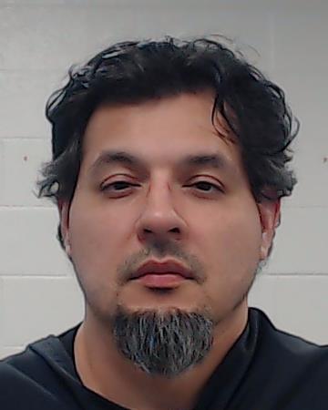 Mugshot of Santiago Miguel Huetra