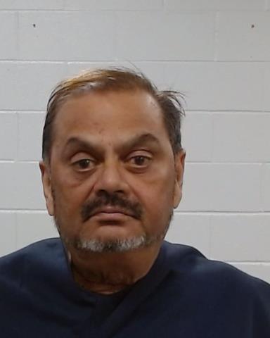 Mugshot of Charles Deva Patel