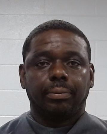 Mugshot of Claude Edward Medlock