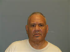 Mugshot of Roy Delarosa